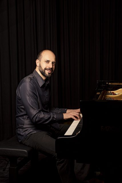 Claude Diallo at the grand piano