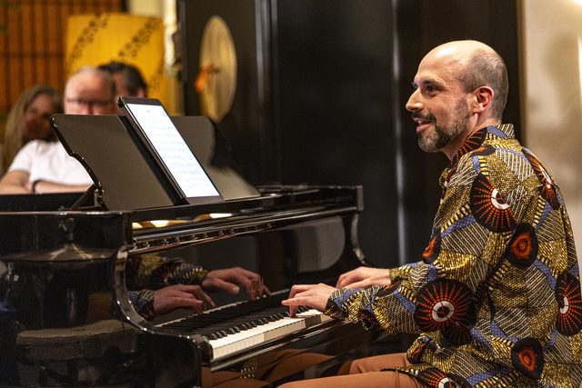 Claude Diallo at the grand piano